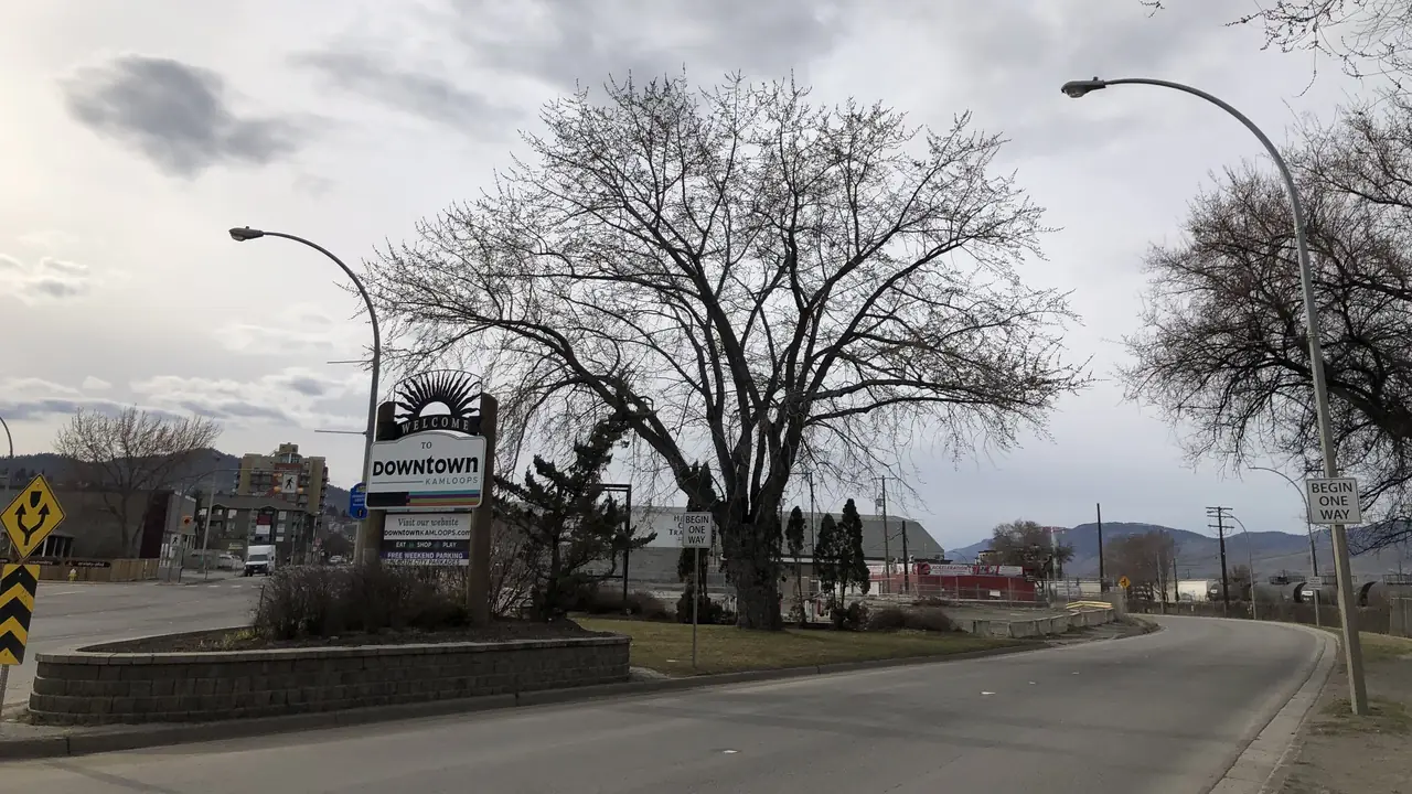The Welcome to Downtown Kamloops sign with the dry hills behind, in the British Columbia city BC Freezer services for commercial refrigeration